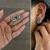 Small size antique finish peacock studs in pure silver