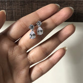 Delicate two cz stone 1.4 cm long tear drop studs in pure silver