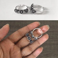 Three flower pattern antique finish toe rings in pure silver (one pair)