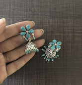 Turquoise stone flower stud pattern jhumkas in pure silver