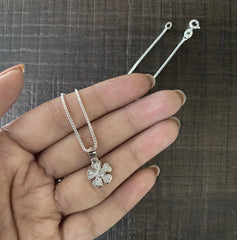 Flower pendant with multiple cz stones with an 18 inch chain in pure silver