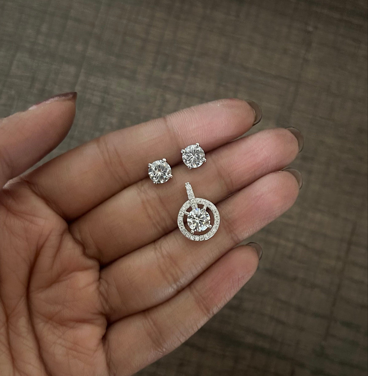 6mm cz four prong grain studs with a multi cz halo shape solitaire pendant set in pure silver