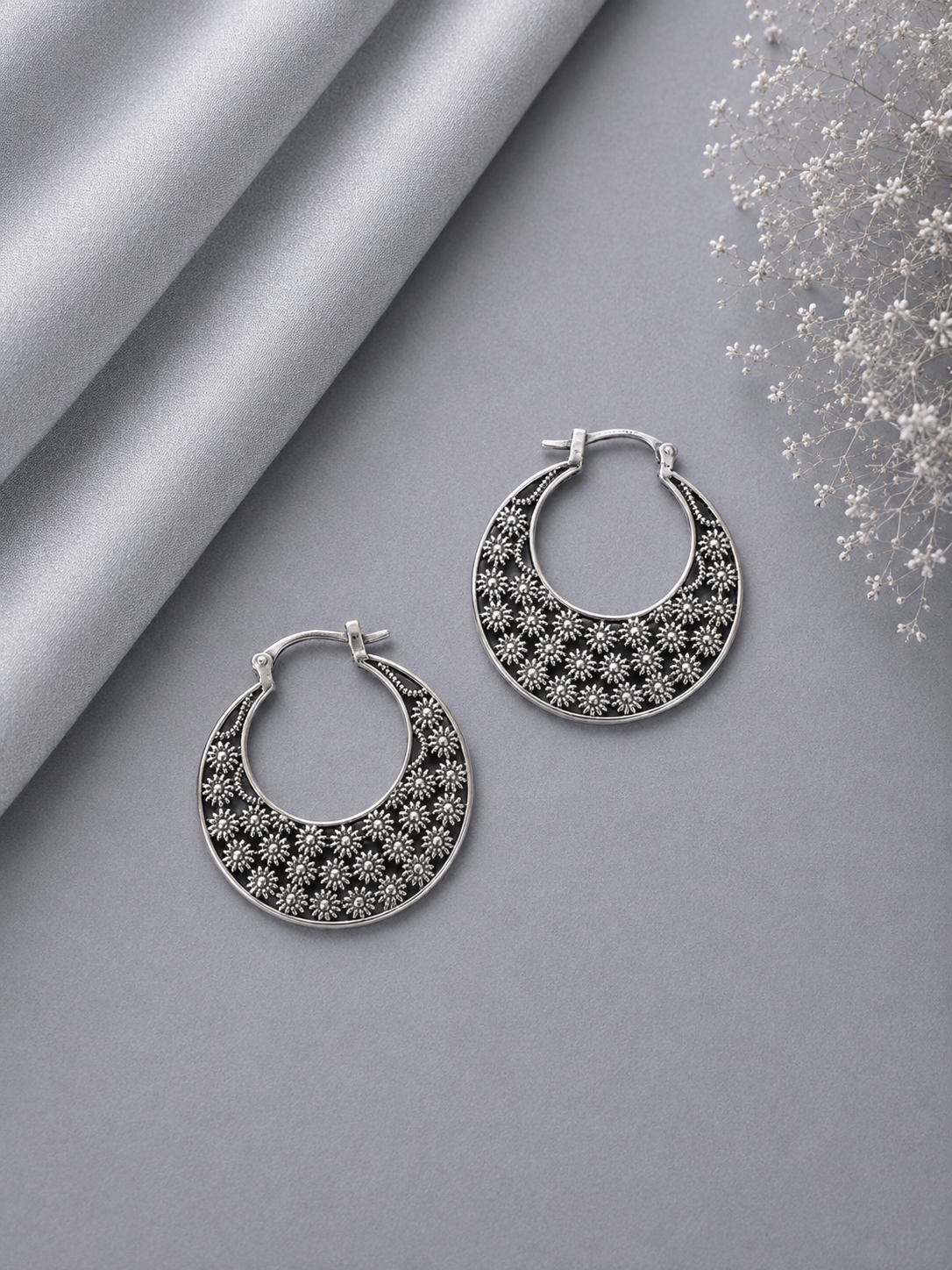 Intricate daisy flower cut work balis in pure silver