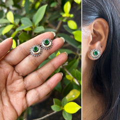 Chandbali studs with an emerald center in pure silver