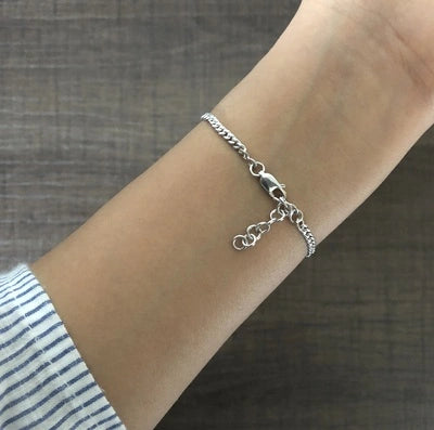 1.2 cm diameter multi cz stone studded evil eye 7'' long adjustable bracelet in pure silver