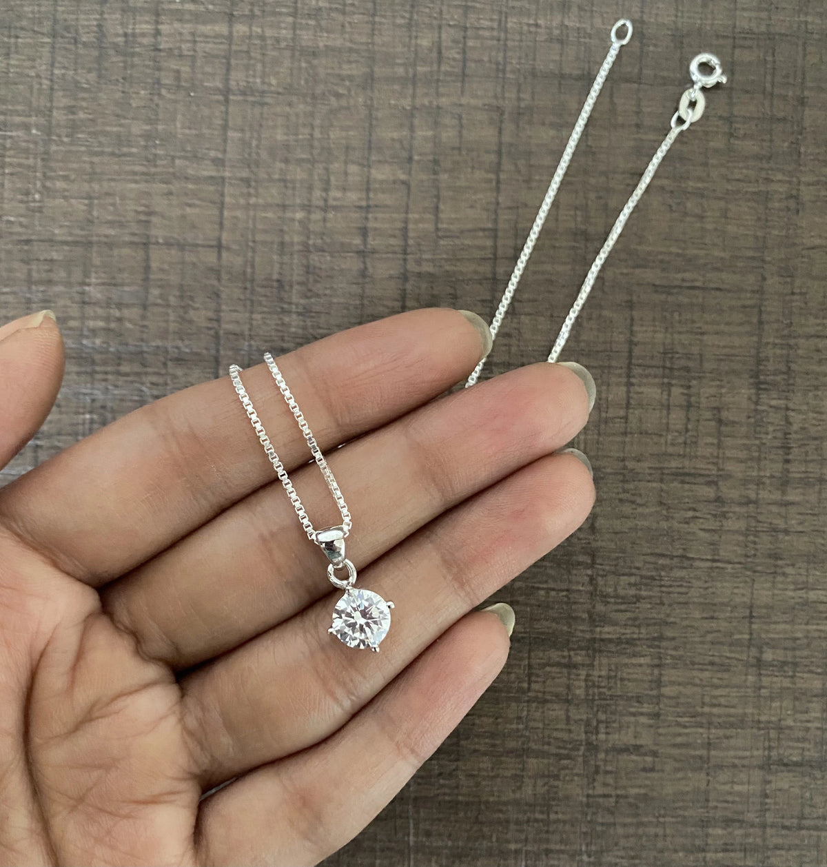 7mm cz stone four prong elevated grain setting pendant with an 18’’ chain in pure silver