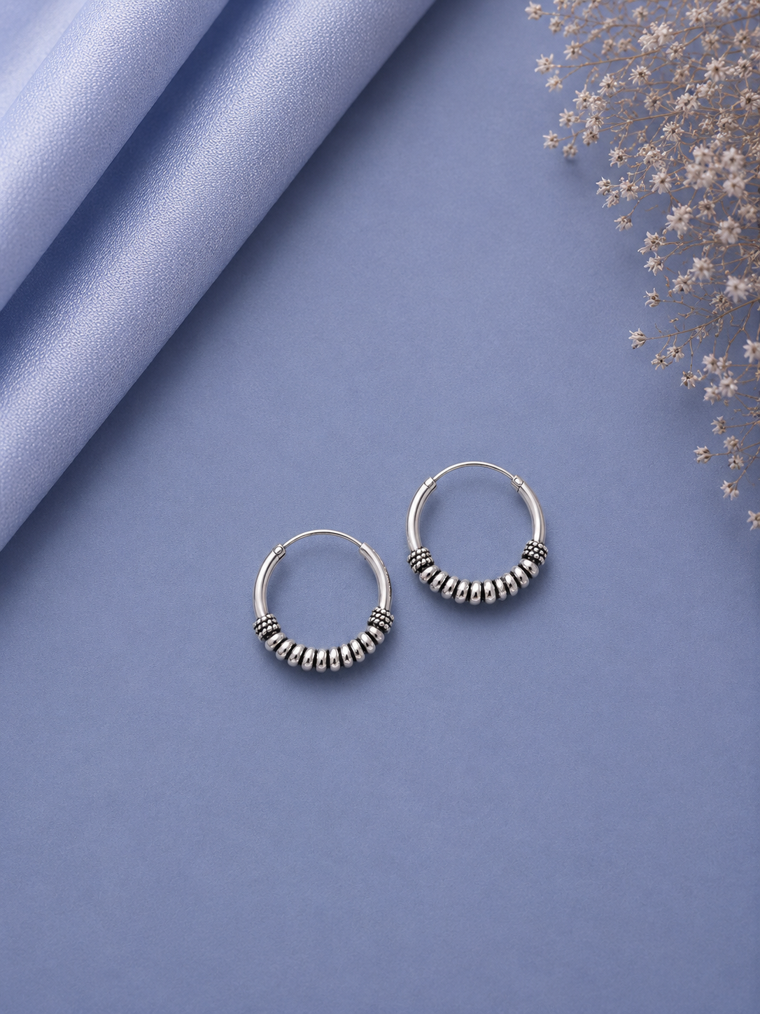 1.7 cm diameter spiral wire work balis in pure silver