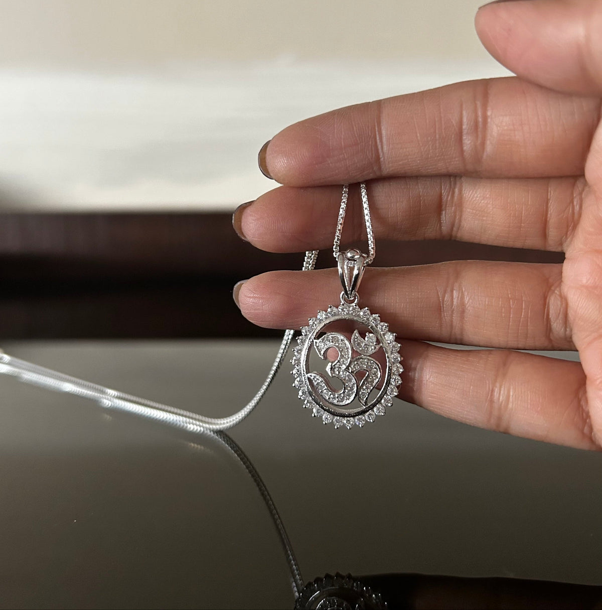 Om shape oval border pendant with multi cz stones and 18inch chain in pure silver