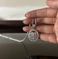 Om shape oval border pendant with multi cz stones and 18inch chain in pure silver