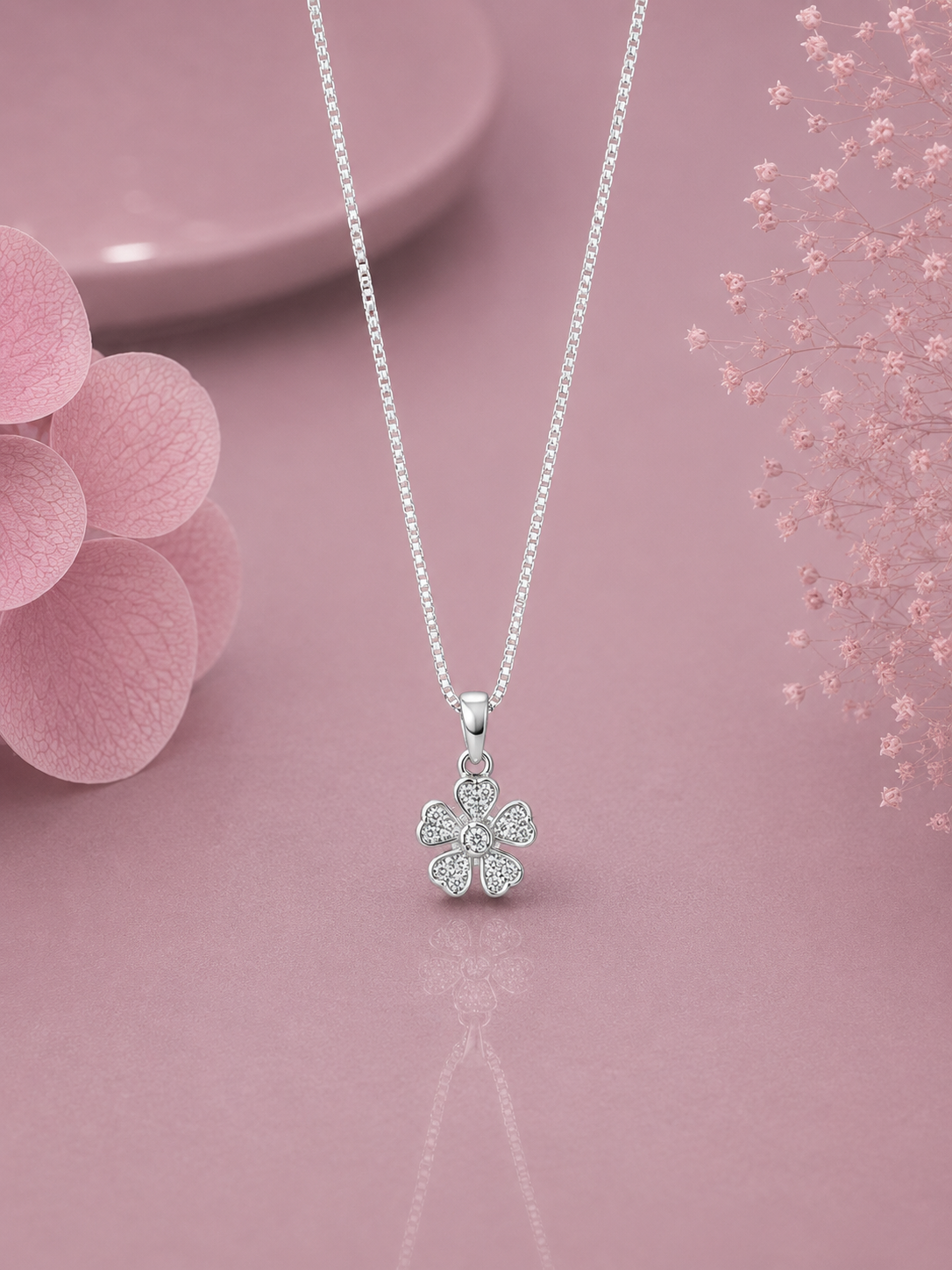 Flower pendant with multiple cz stones with an 18 inch chain in pure silver