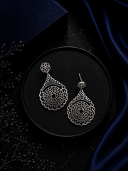 Intricate cut work dangling studs crafted in pure silver
