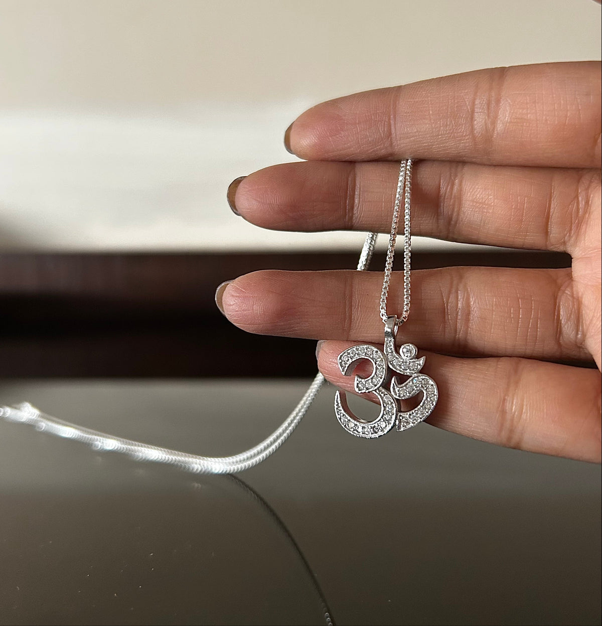 Om shape multi cz micron setting pendant with an 18inch chain in pure silver