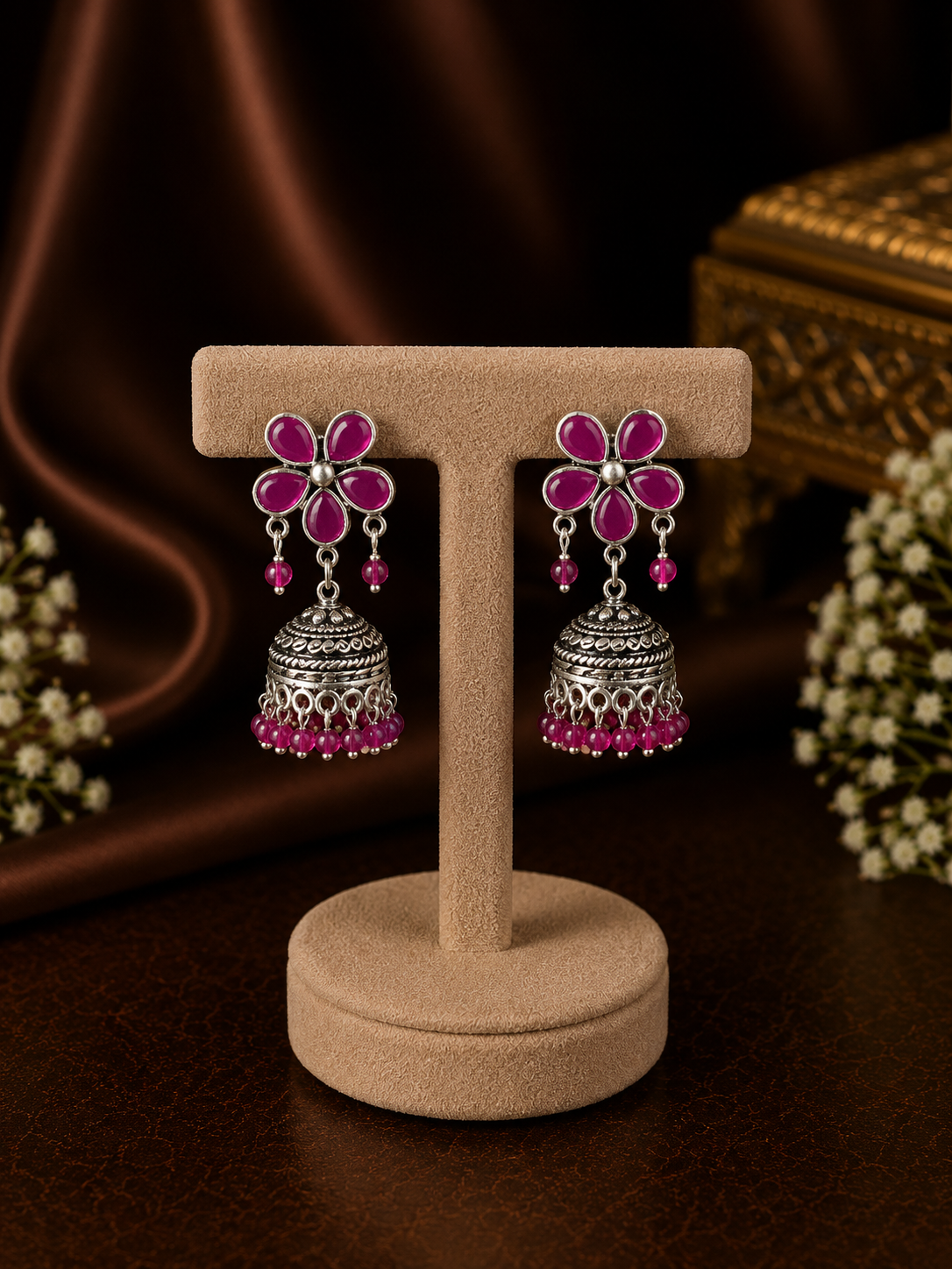 Ruby pink cut stone flower stud pattern jhumkas in pure silver