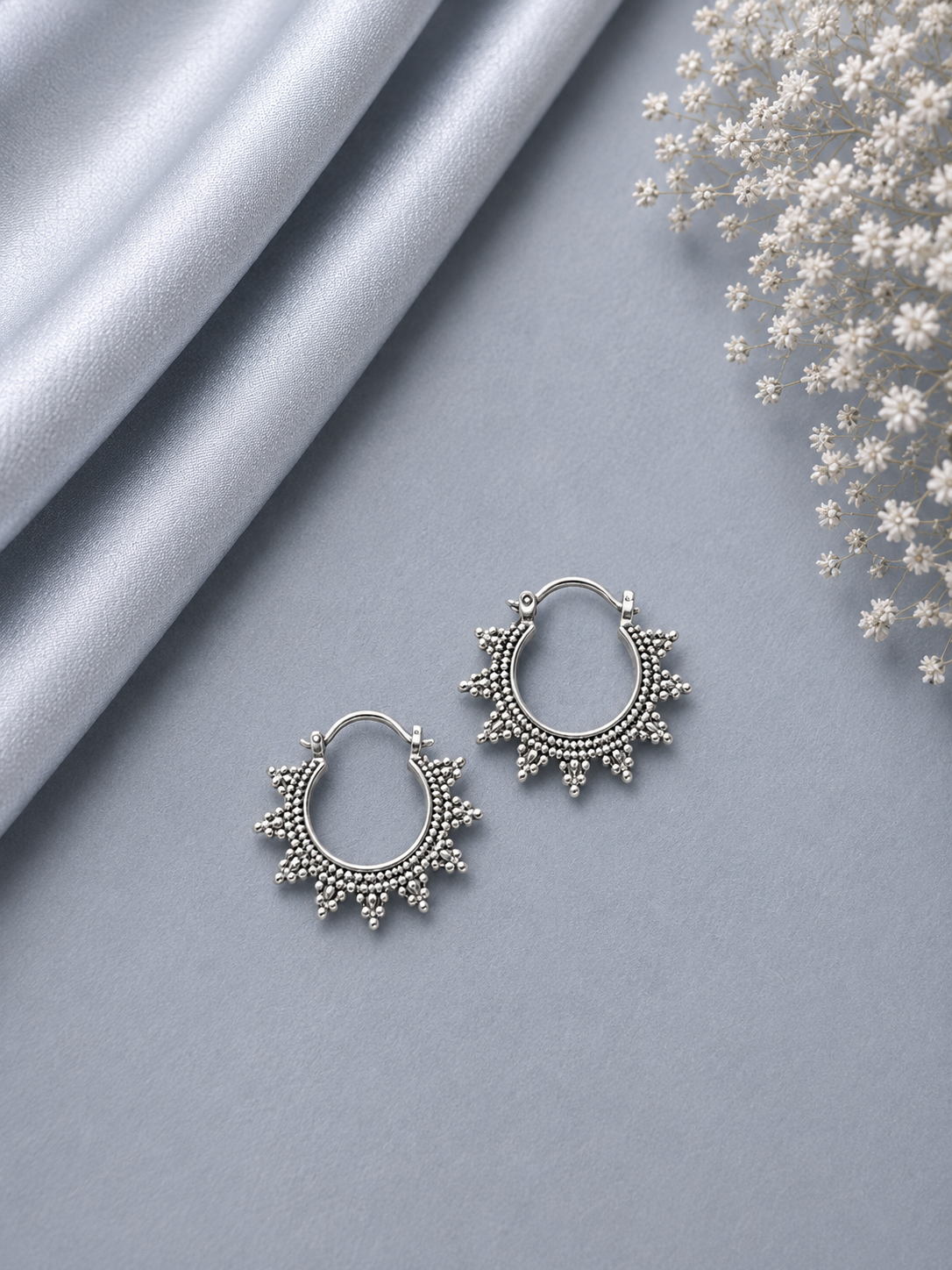 Small rava work edgy balis in pure silver