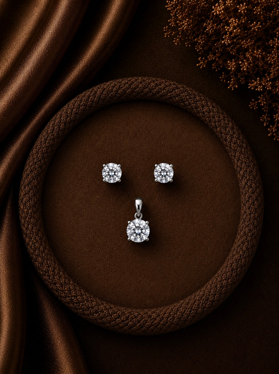 6mm four prong cz stone studs with a matching 7mm cz pendant in pure silver