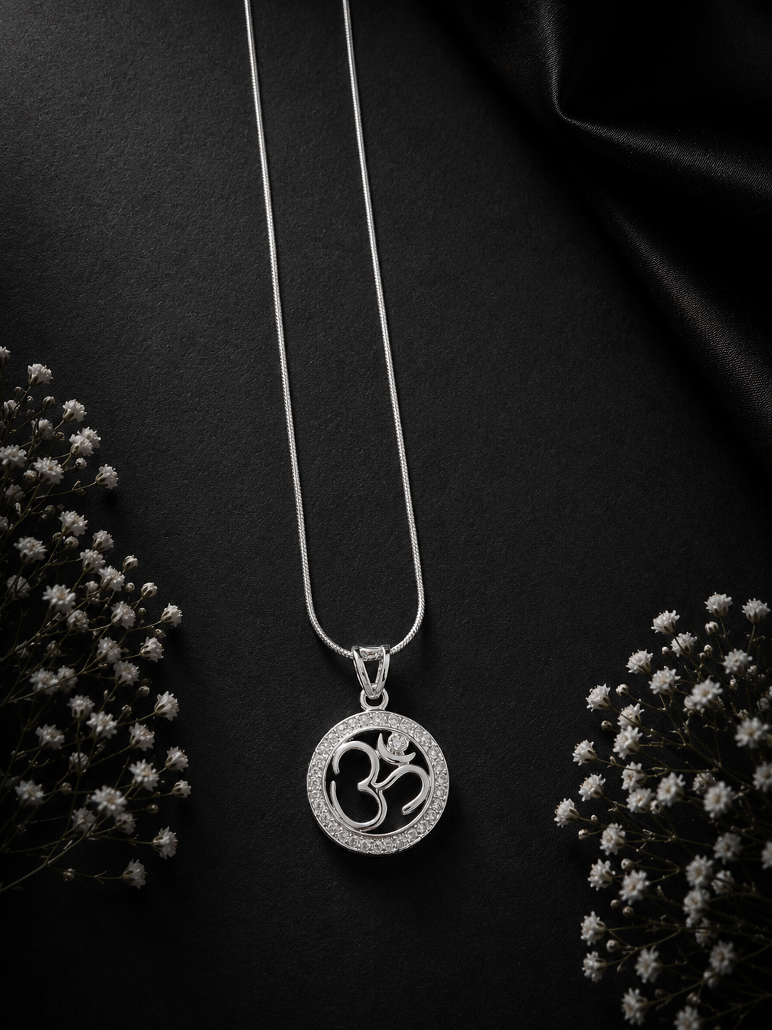 Studded border Divine Om pendant with a 20inch shiny chain in pure silver