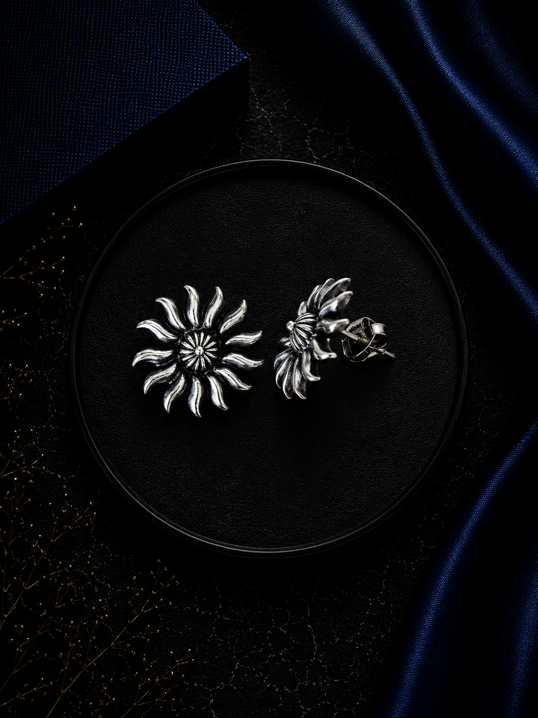 Antique finish 'Surya' motif studs in pure silver