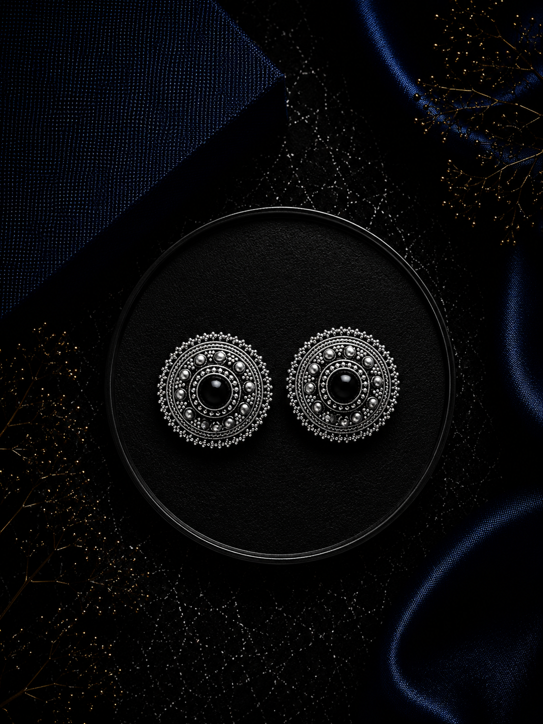 Big size 2.5 cm diameter rava and carving work studs with a black onyx center in pure silver