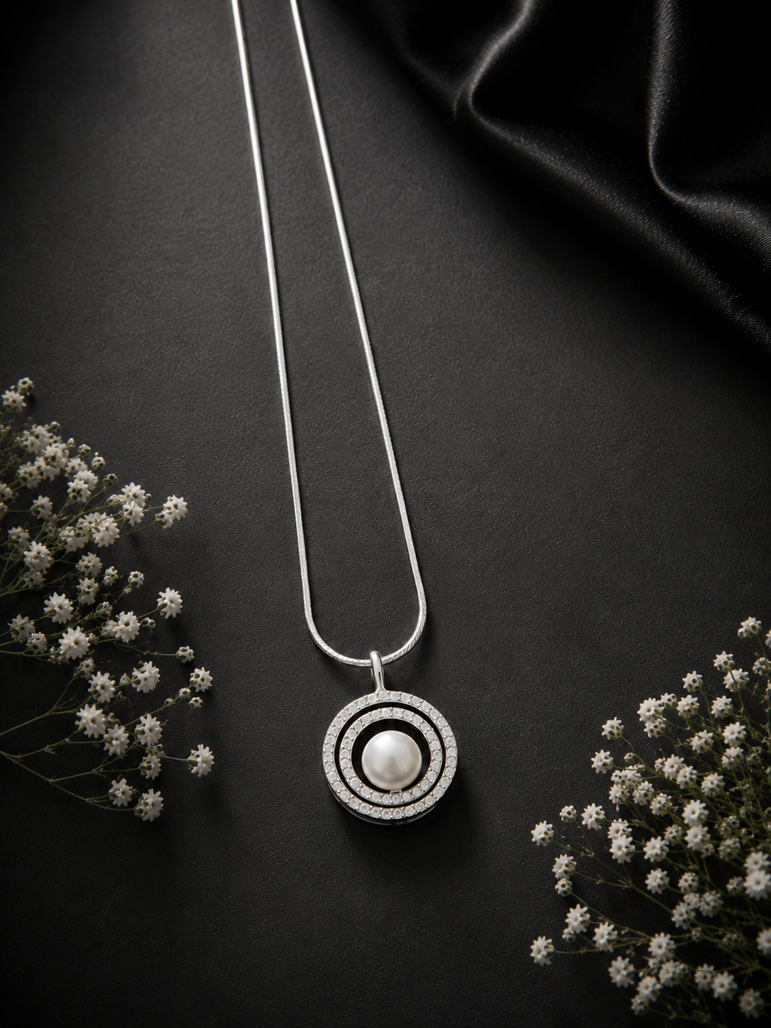 Two studded circle pearl center pendant with a 20inch shiny chain in pure silver