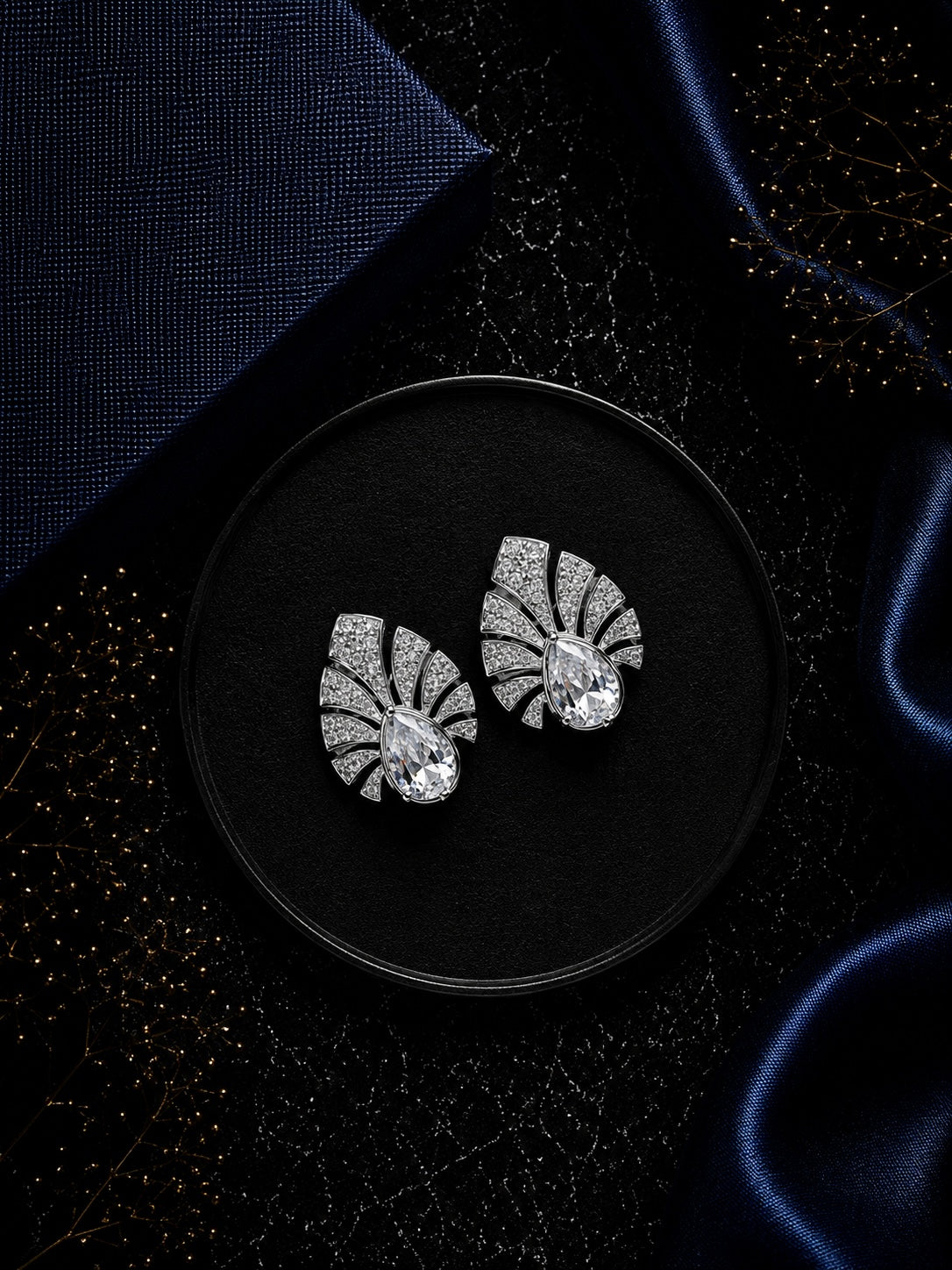 Multiple cz stone peacock feather motif earstuds in pure silver