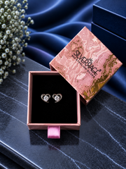Curved heart single cz studs in pure silver