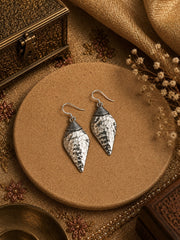Shell shape beaten texture handmade earrings in pure silver