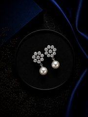 Flower cz stone studs with pearl drops in pure silver