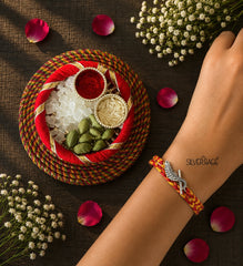 Silver Morpankh with Flute motif rakhi