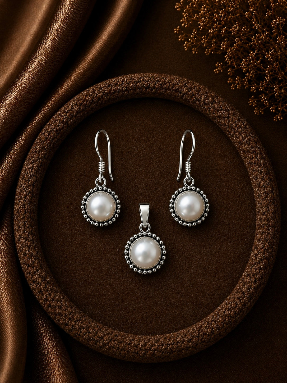 1.2cm diameter fresh water pearl rava work hangings with a matching pendant in pure silver