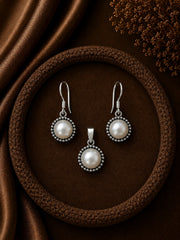 1.2cm diameter fresh water pearl rava work hangings with a matching pendant in pure silver