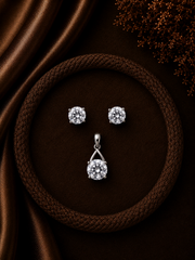 7mm cz stone studs with an inverted 'v' 8mm cz pendant set in pure silver