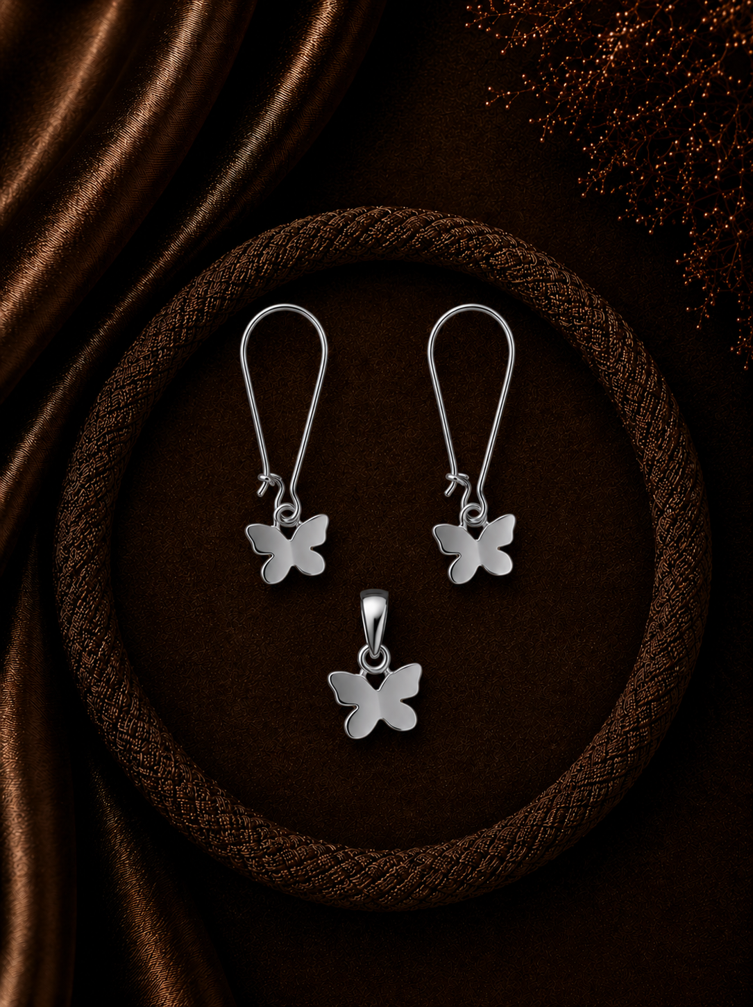 Butterfly loops and matching pendant set in pure silver
