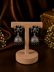 Black onyx flower stud pattern jhumkas in pure silver