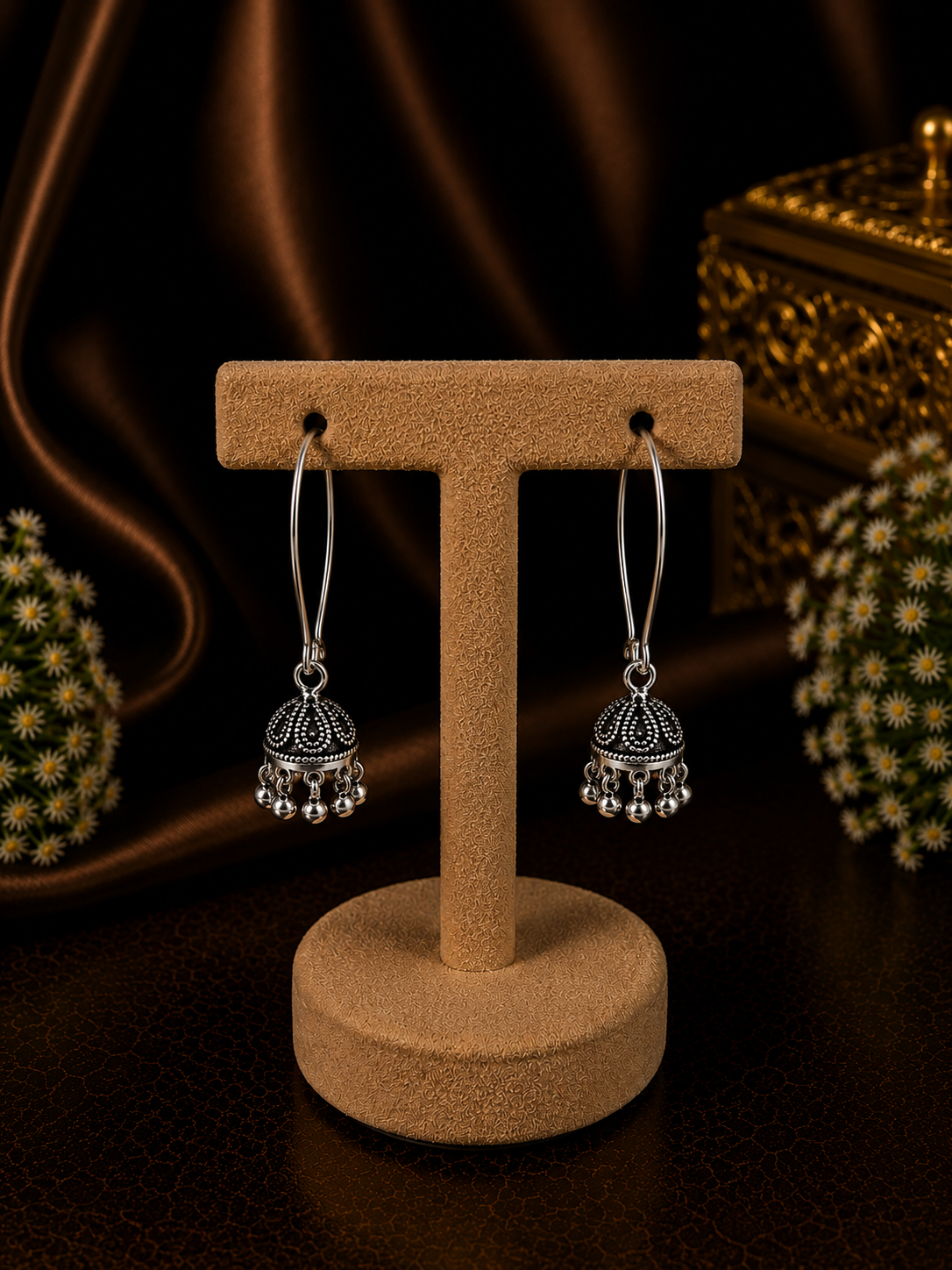 Antique finish small size jhumkas with a lockable loop in pure silver