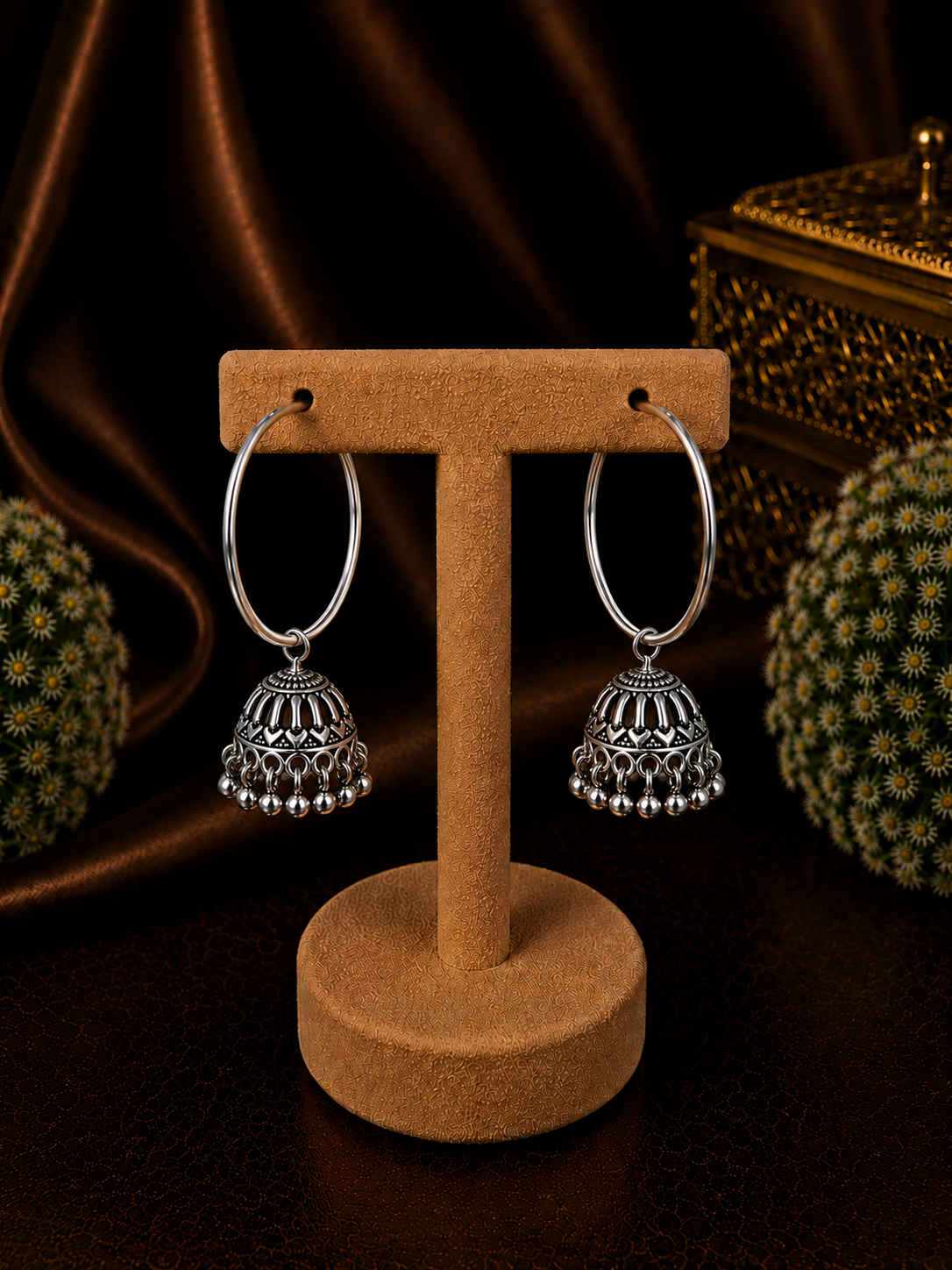 Antique finish jhumkas in 3 cm thick plain balis in pure silver