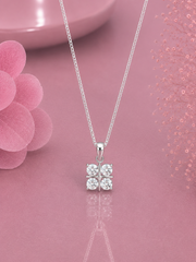 1cm diameter four cz stone pendant with an 18’’ chain in pure silver