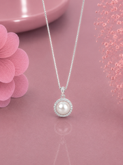 1.4 cm diameter pearl pendant with a multiple cz stone border and an 18’’ chain in pure silver