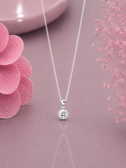 9mm diameter cz stone pendant with an 18'' chain in pure silver