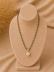 8mm single cz stone pendant in pure silver with 22 kt. gold plating suspended from an 18'' artificial chain
