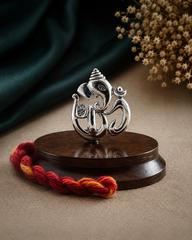 Pure Silver Om-Ganesha Idol on a rosewood base