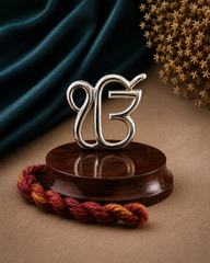 Auspicious EK Onkar Pure Silver Idol on a rosewood base