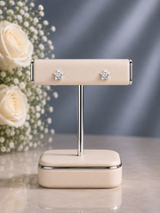 Small star studs with a 3 mm cz stone set in pure silver