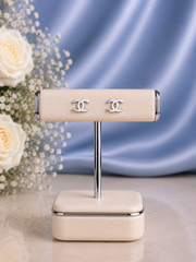 Flat opposite 'C' studs in pure silver