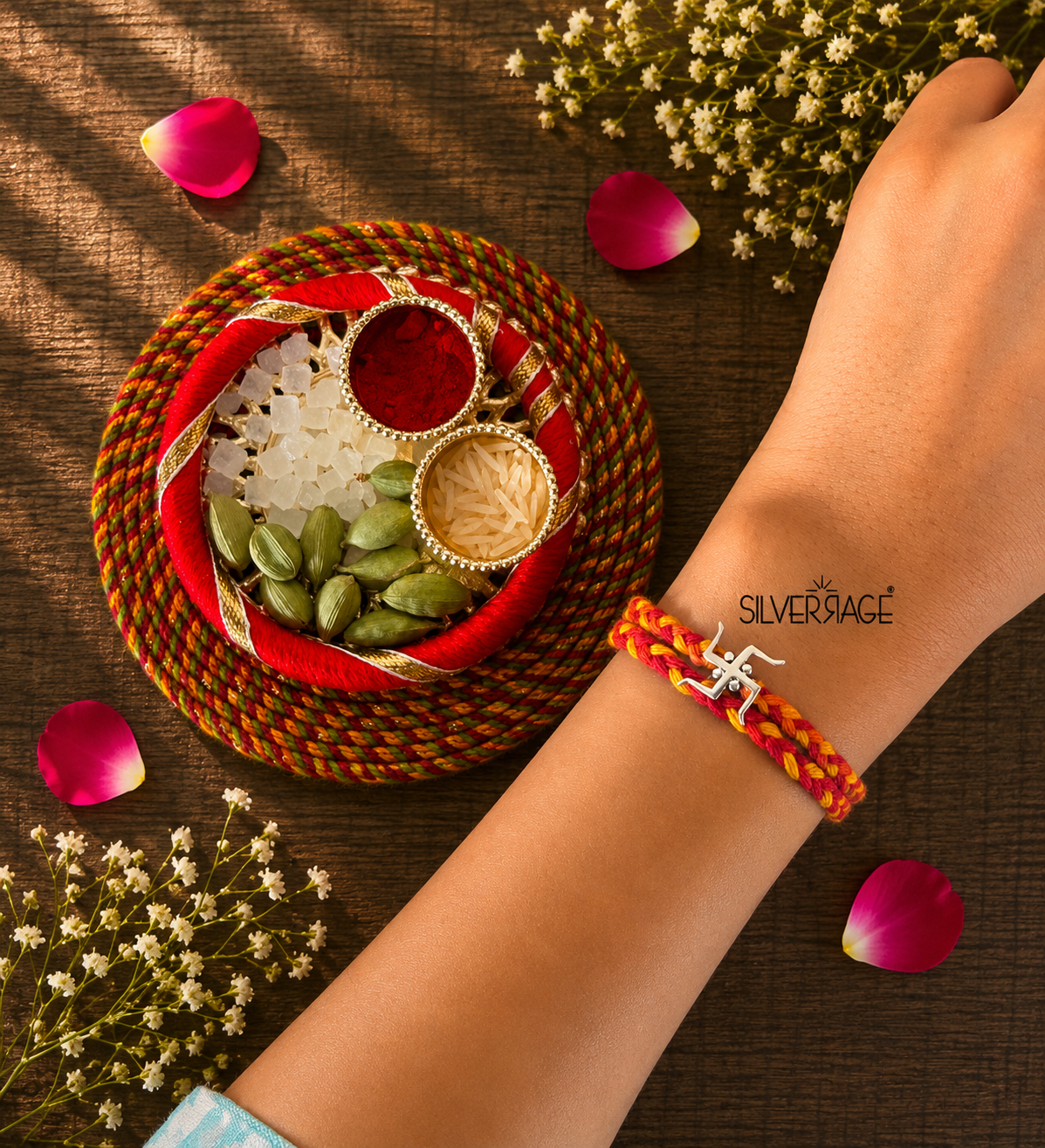 Silver Swastik motif rakhi
