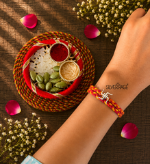 Silver Swastik motif rakhi