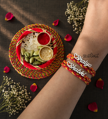 Combo of Silver 'Bhaiya' and 'Bhabhi' motif rakhi