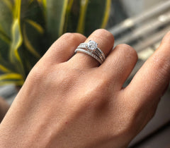 Engagement style studded three line ring with a 6mm elevated cz stone center in pure silver