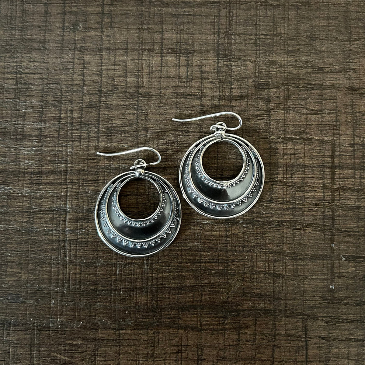 Round antique finish rava work earrings in pure silver
