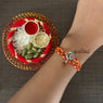 Silver Round om with rudraksh rakhi