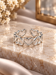 Multiple hearts adjustable ring in pure silver